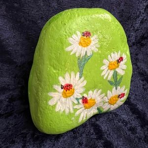hand painted rock. 3x3 inches and weighs 1 pound 4 ounces